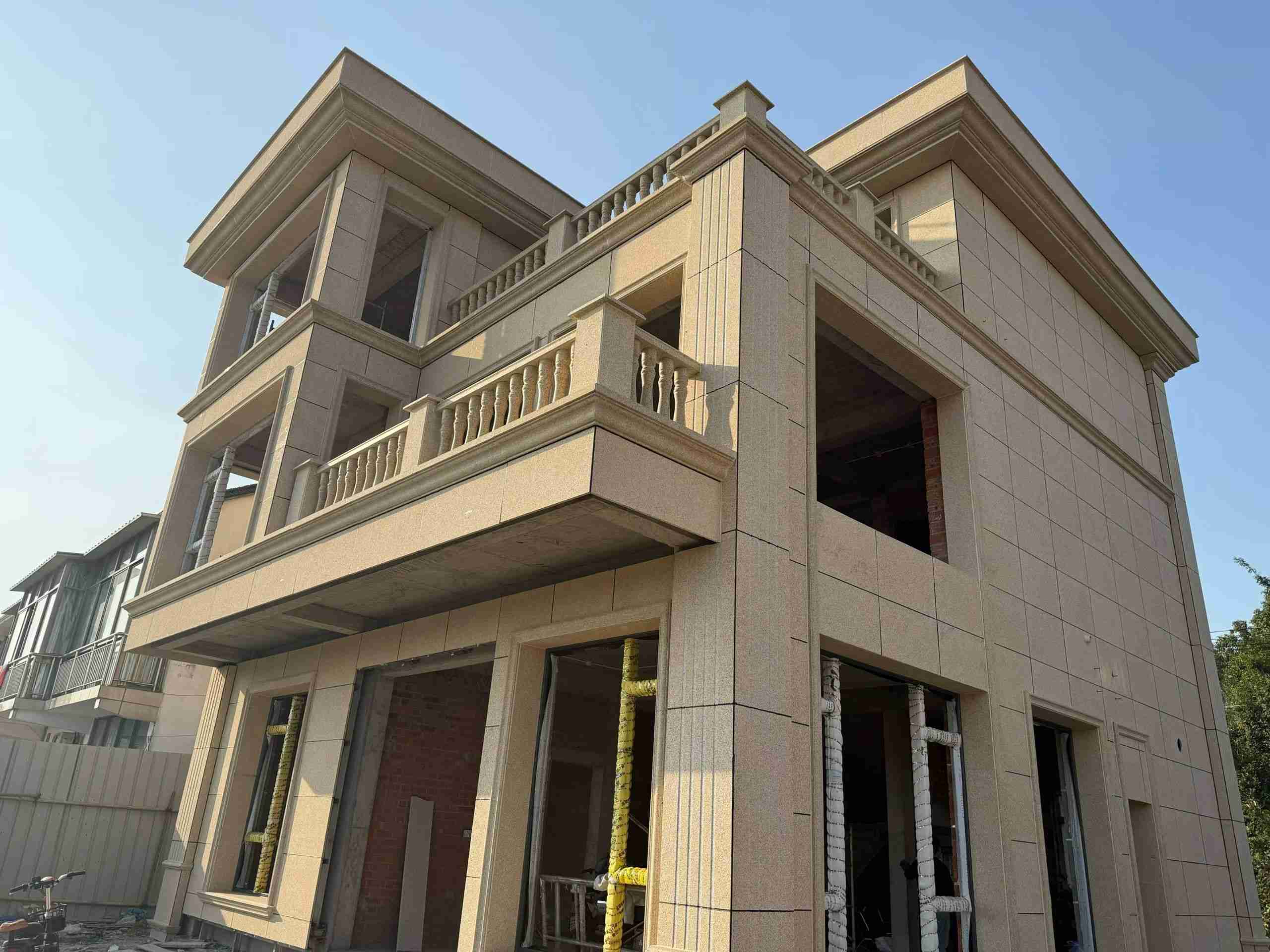 滨州 黄金麻花岗岩石材荔枝面外墙干挂效果展示