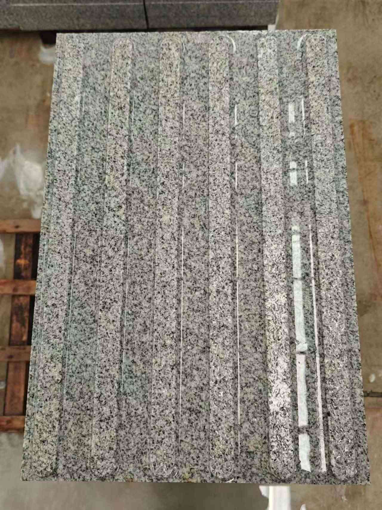 滨州 芝麻白花岗岩荔枝面雕刻盲道，盲条